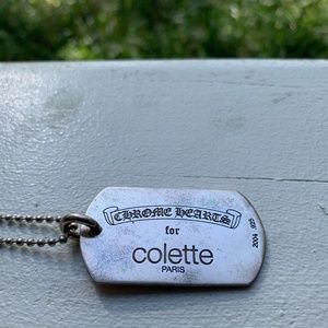 Chrome Hearts silver dog tag necklace.